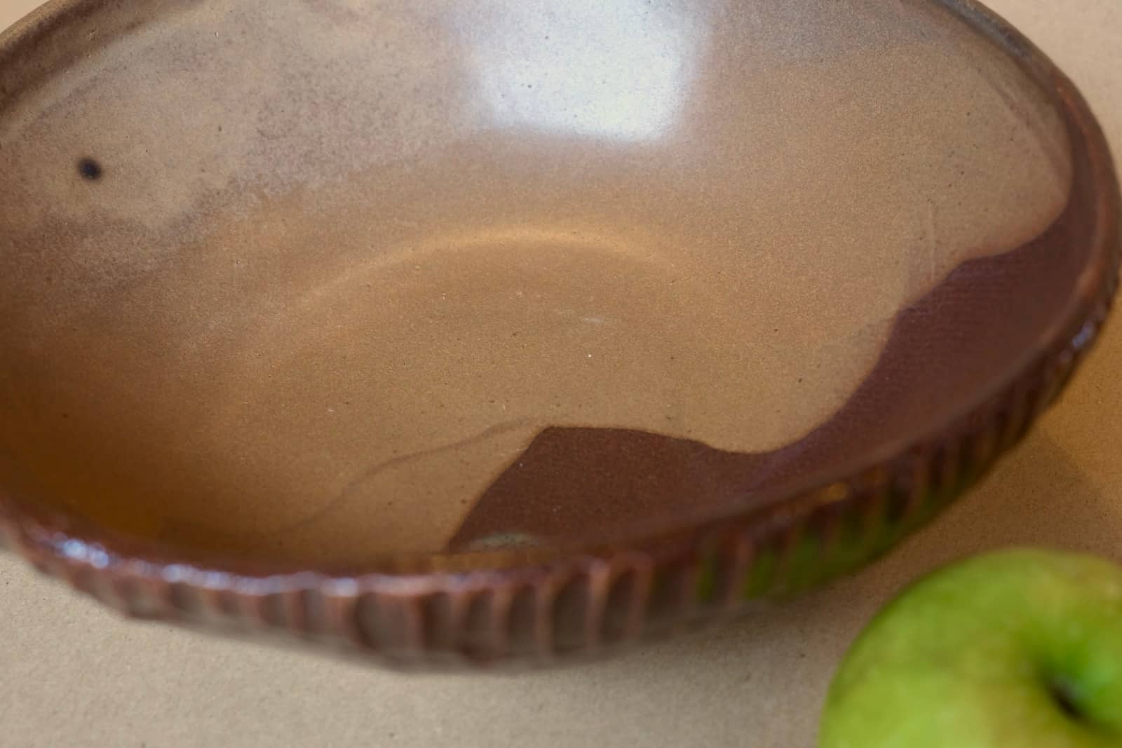 Carved texture bowl with glossy interior and matte exterior.